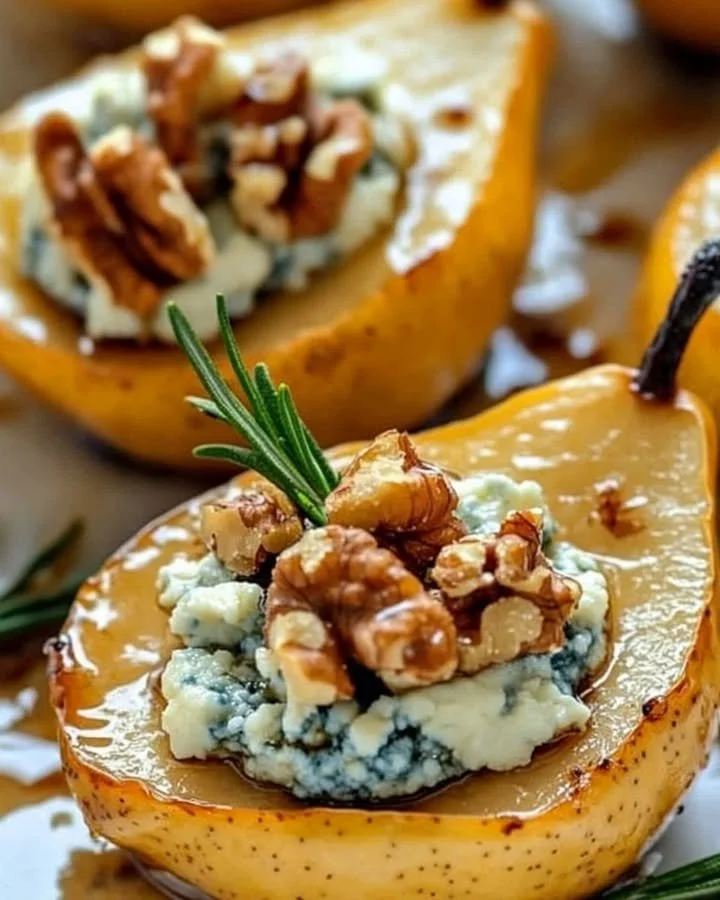 Delicious caramelized pears drizzled with blue cheese dressing on a plate.