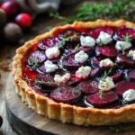 Delicious Cranberry and Roasted Beet Tart on a rustic wooden table