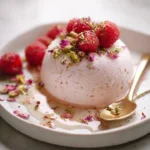 Frozen Rose Mascarpone Mousse topped with fresh raspberries