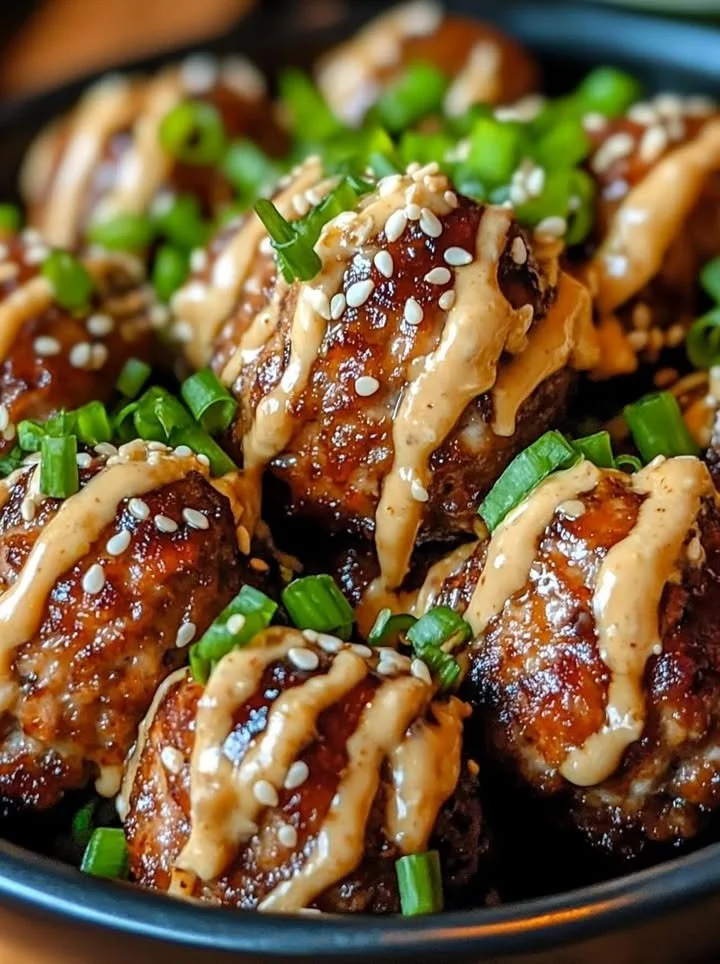 Delicious Korean BBQ meatballs served with spicy mayo dip