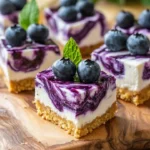 No-bake blueberry and goat cheese cheesecake bites on a white plate
