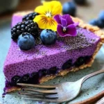 No-bake vegan blueberry chia seed pie slice on a plate