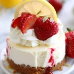 No-Bake Strawberry Lemon Cheesecake topped with fresh strawberries and lemon slices