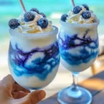 Ocean Love Colada tropical cocktail served in a beautiful glass