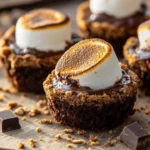 Delicious S'mores Brownie Cups topped with marshmallows and chocolate