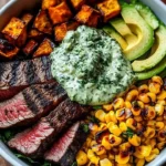 Steak Bowl featuring avocado, roasted corn, and cilantro cream sauce
