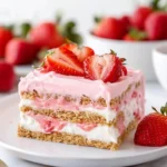 Delicious Strawberry Eclair Cake with fresh strawberries and cream filling