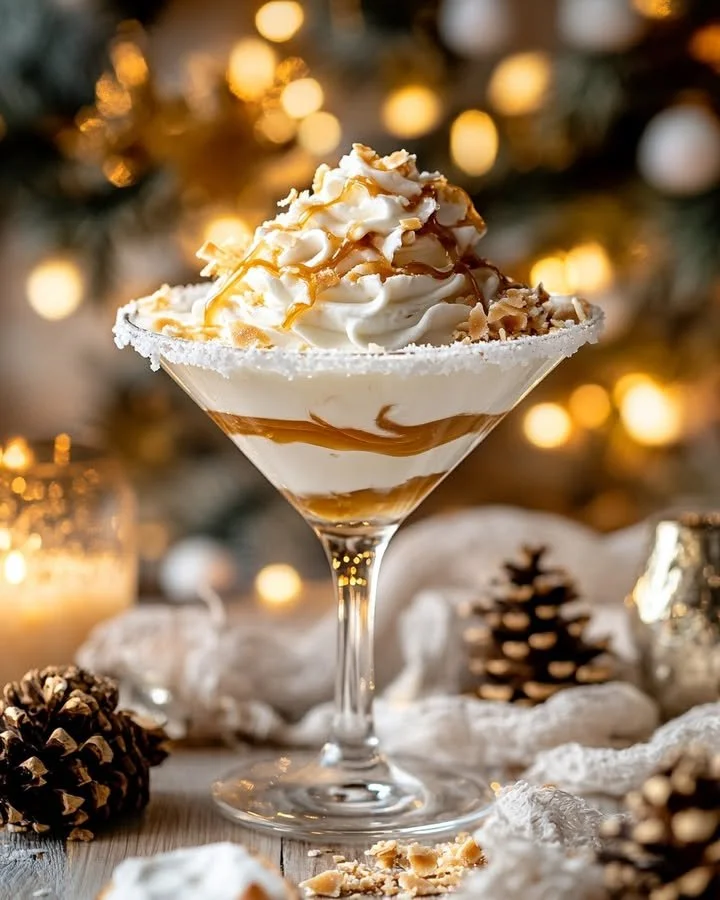 Toasted Coconut Caramel Mocktini in a stylish glass with coconut and caramel garnish