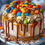 Delicious Yellow Paradise No-Bake Cheesecake topped with M&Ms and toffee